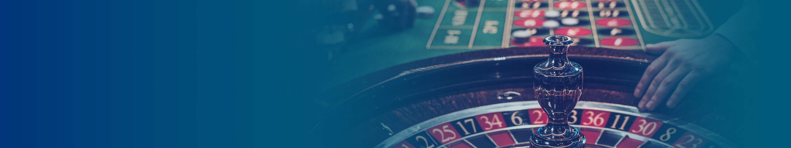 In casino, there's a gambling table with roulette.